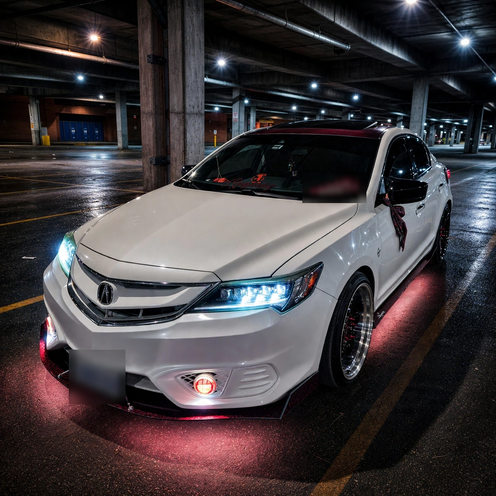 White Acura ILX in a night garage with a subtle red underglow