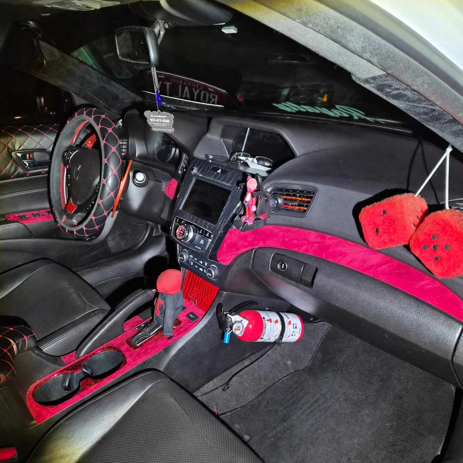 Cleaned wide view of the Acura custom black-and-red interior