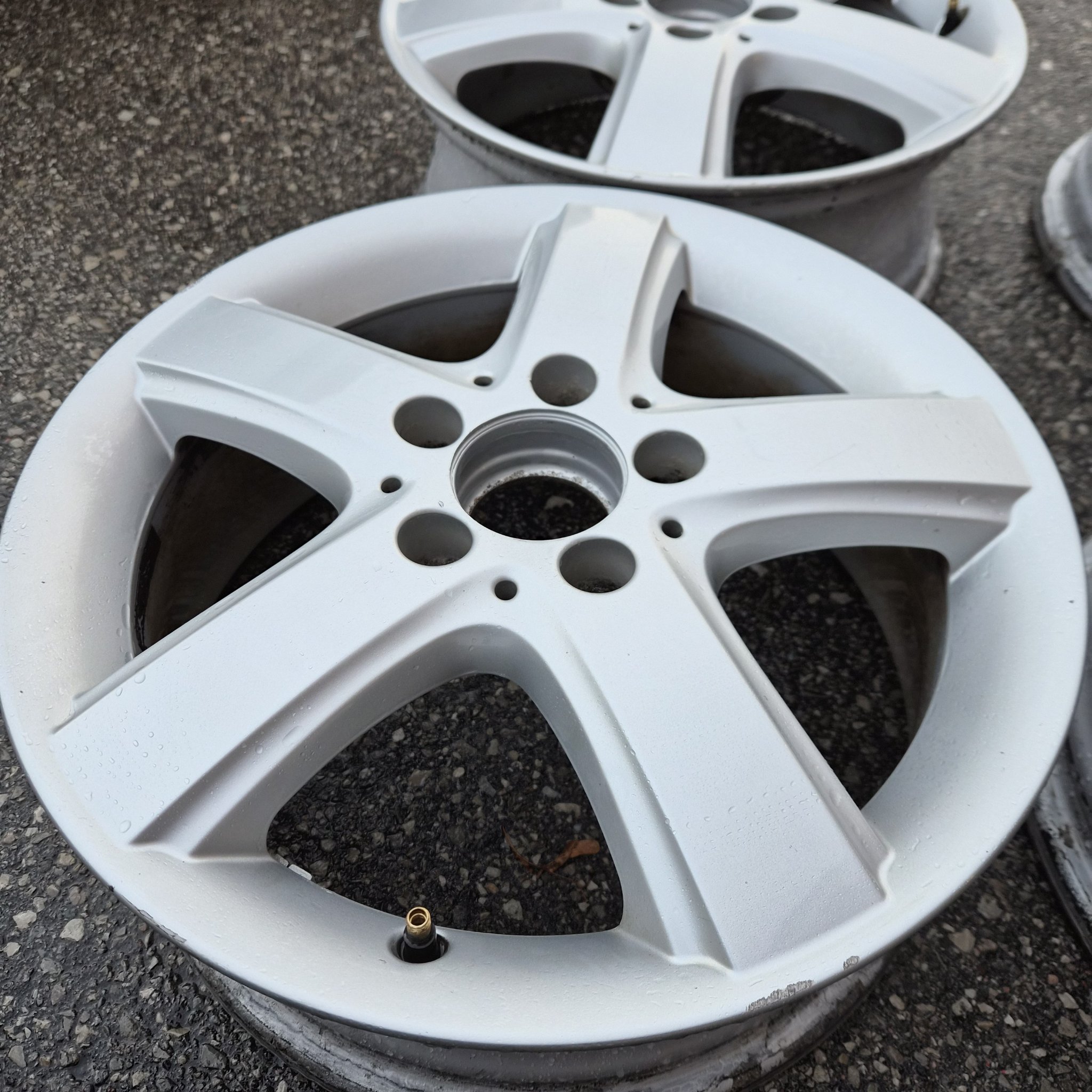 Clean silver Mercedes wheel after refinishing